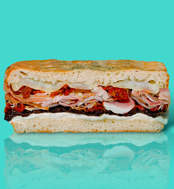 Roma Focaccia con porchetta, crema de Pecorino, tomate seco y trufa-Sandwich Lovers